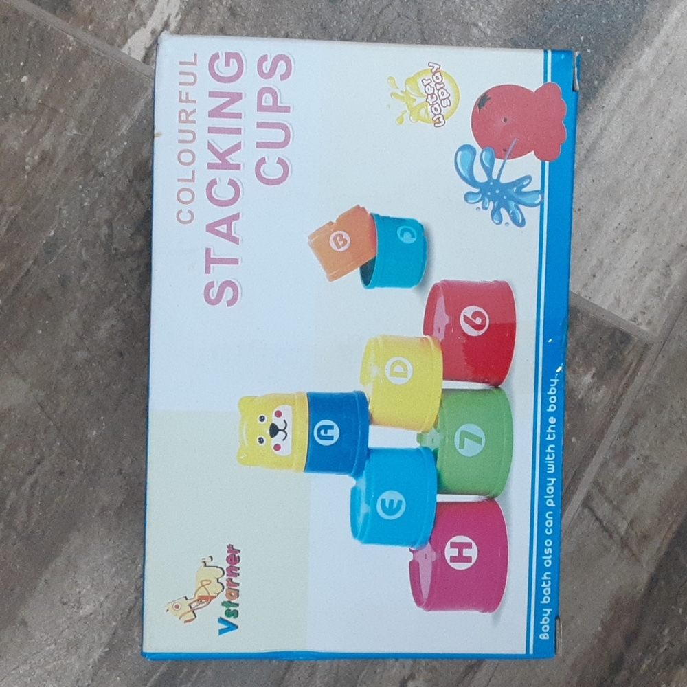Colorful stacking cups new in box